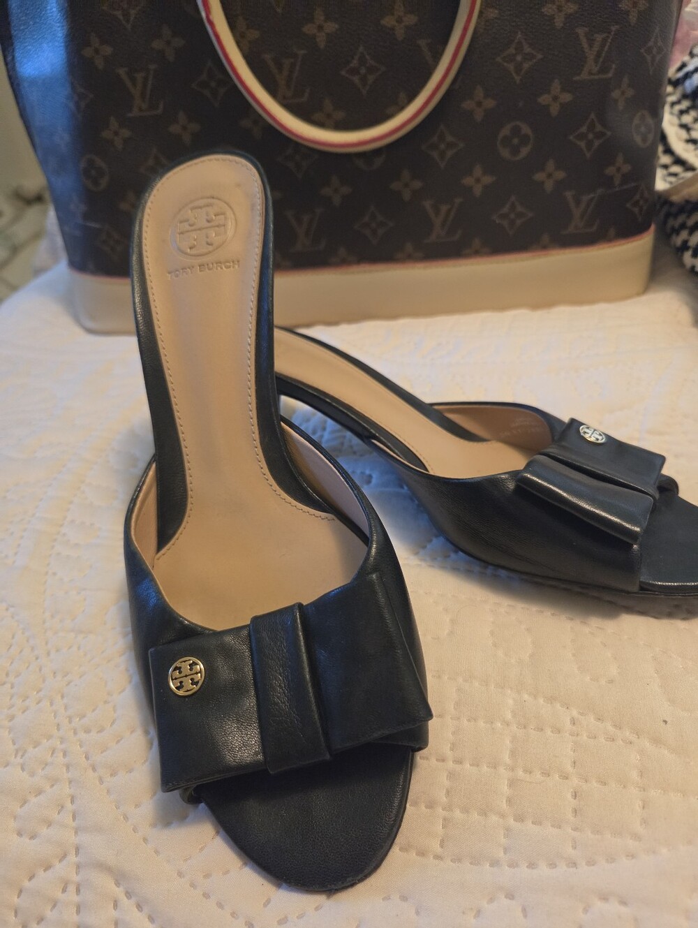 Tory Burch Black Leather Slide Mules with Bow and Logo Medallion